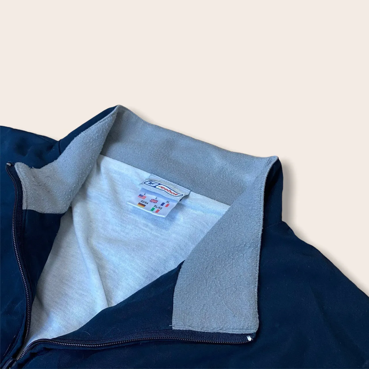 Reebok navy track jacket